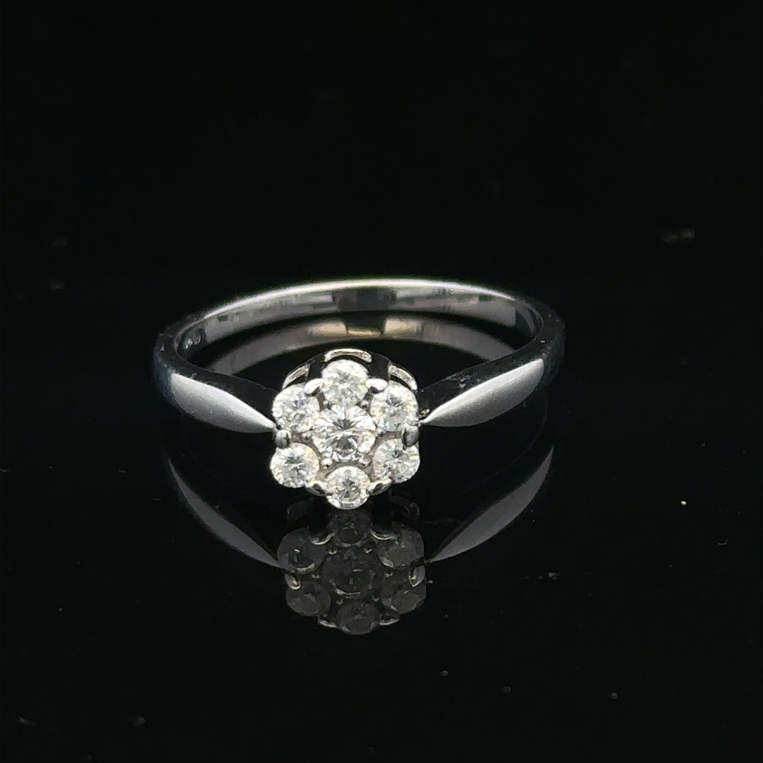 9ct white gold diamond cluster ring size O 1/2, featuring a sparkling diamond cluster design on a sleek band.