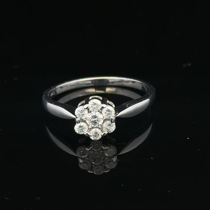 9ct white gold diamond cluster ring size O 1/2, featuring a sparkling diamond cluster design on a sleek band.