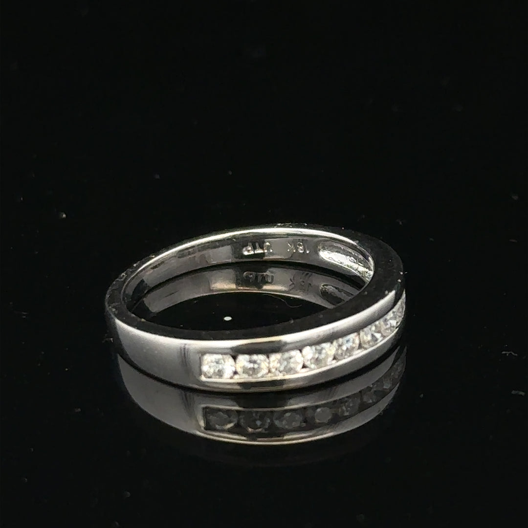 18ct white gold diamond ring in size L with sparkling diamonds, showcasing elegant jewelry design by Un.