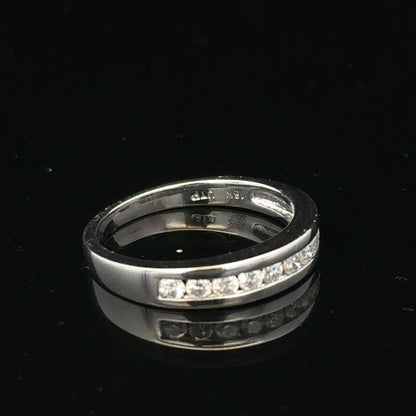 18ct white gold diamond ring in size L with sparkling diamonds, showcasing elegant jewelry design by Un.