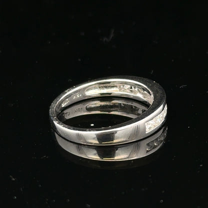 18ct white gold diamond ring in size L with sparkling diamonds, showcasing elegant jewelry craftsmanship.