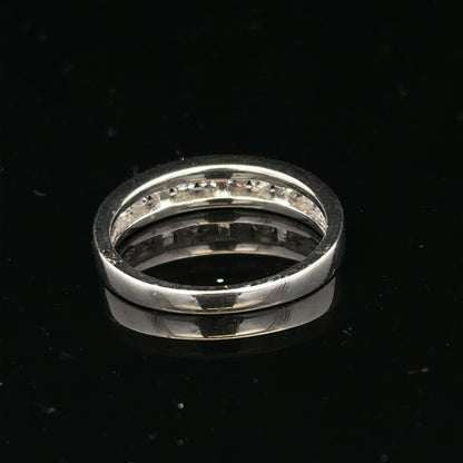18ct white gold diamond ring in size L with sparkling diamonds, showcasing elegant jewelry design and craftsmanship.