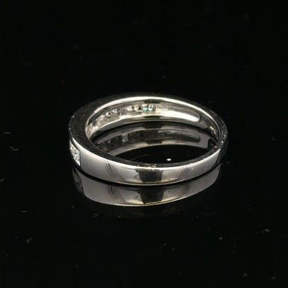 18ct white gold diamond ring in size L with sparkling diamonds, showcasing elegant jewelry design.