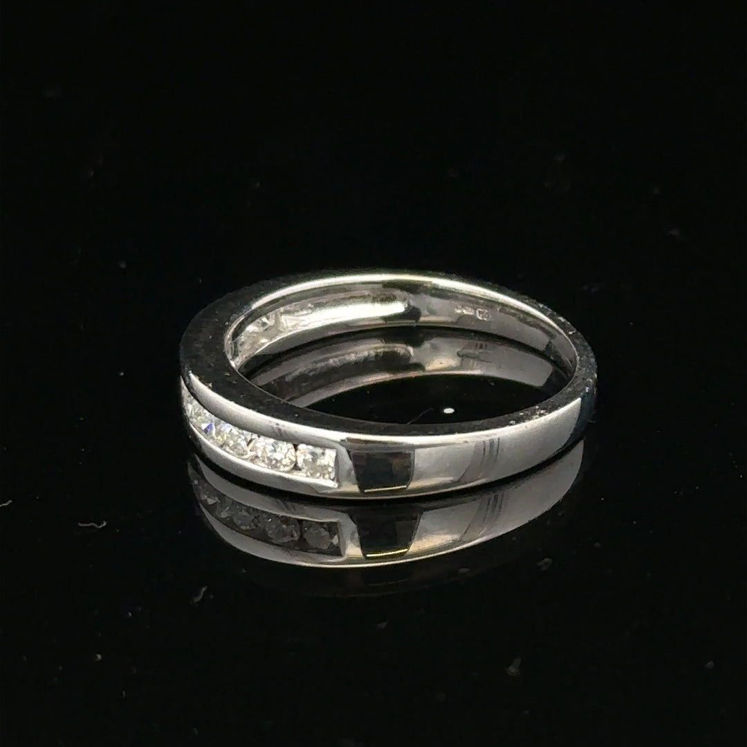 18ct white gold diamond ring in size L with sparkling diamonds, crafted by Un.