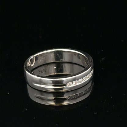 9ct white gold diamond ring with 0.20 carats, size M, featuring a sparkling central stone and elegant band design.