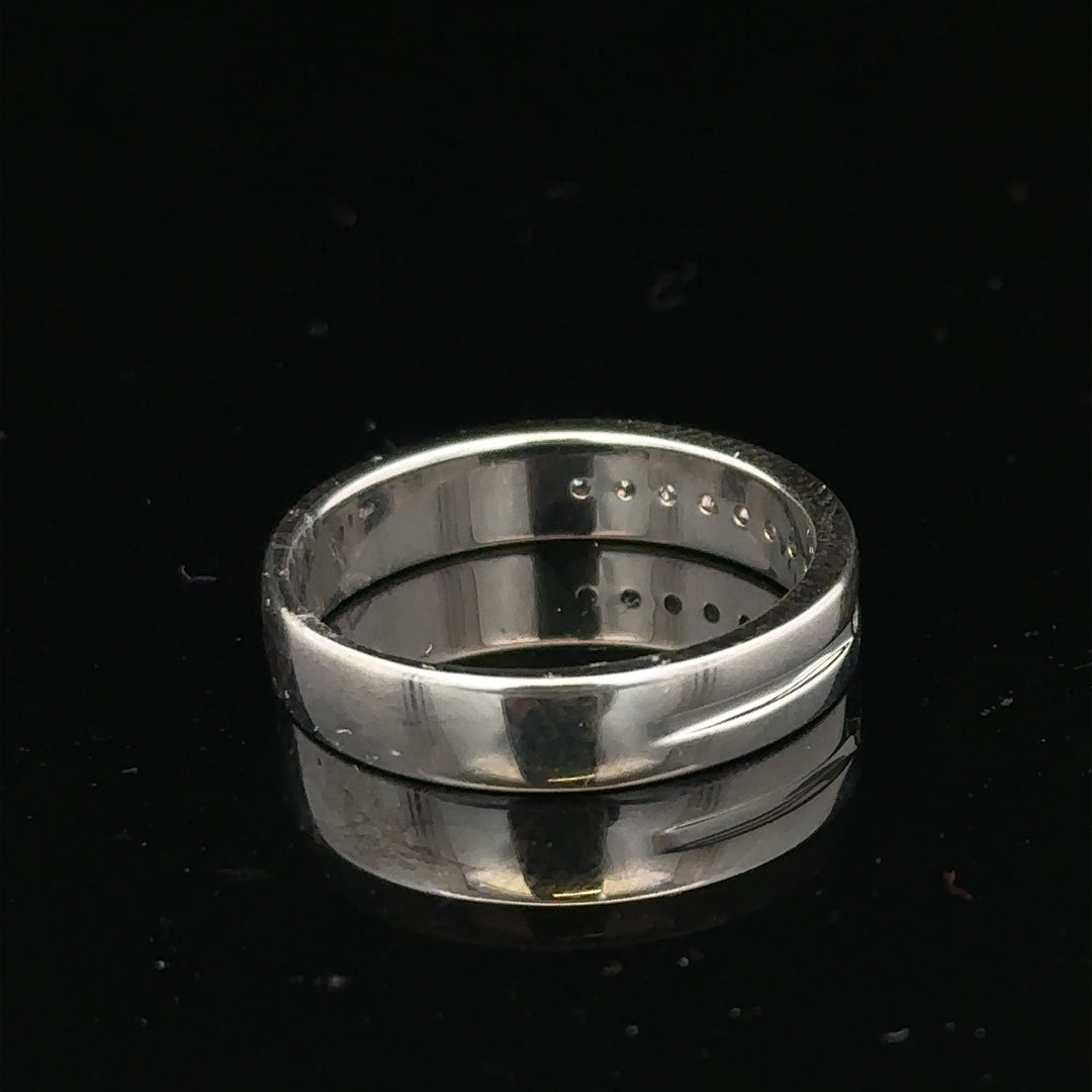 9ct white gold diamond ring with 0.20 carats, size M, featuring a sparkling diamond setting.