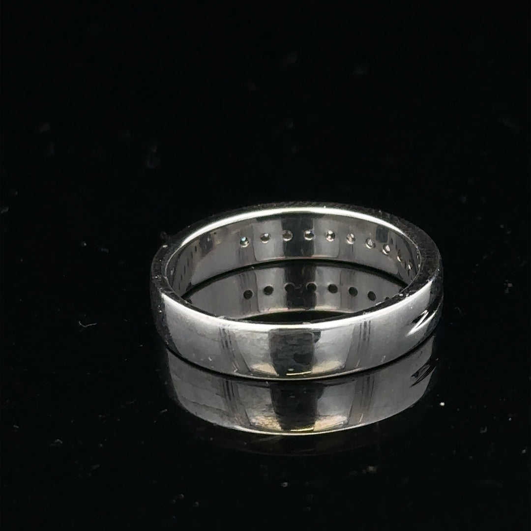9ct white gold diamond ring with 0.20 carats, size M, featuring a sparkling solitaire diamond on a sleek band.