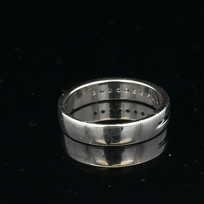 9ct white gold diamond ring with 0.20 carats, size M, featuring a sparkling solitaire diamond on a sleek band.