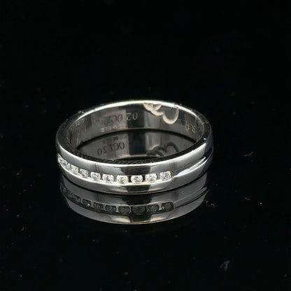 9ct white gold diamond ring with 0.20 carats, size M, featuring a sparkling central diamond and elegant band design.