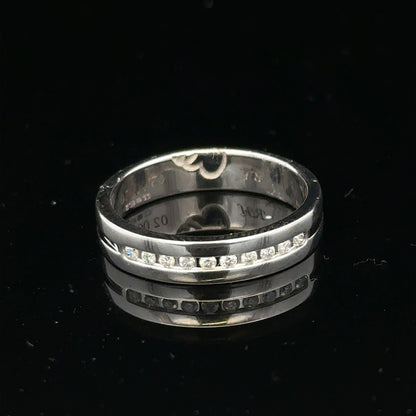 9ct white gold diamond ring with 0.20 carats, size M, showcasing sparkling diamonds and a sleek band design.