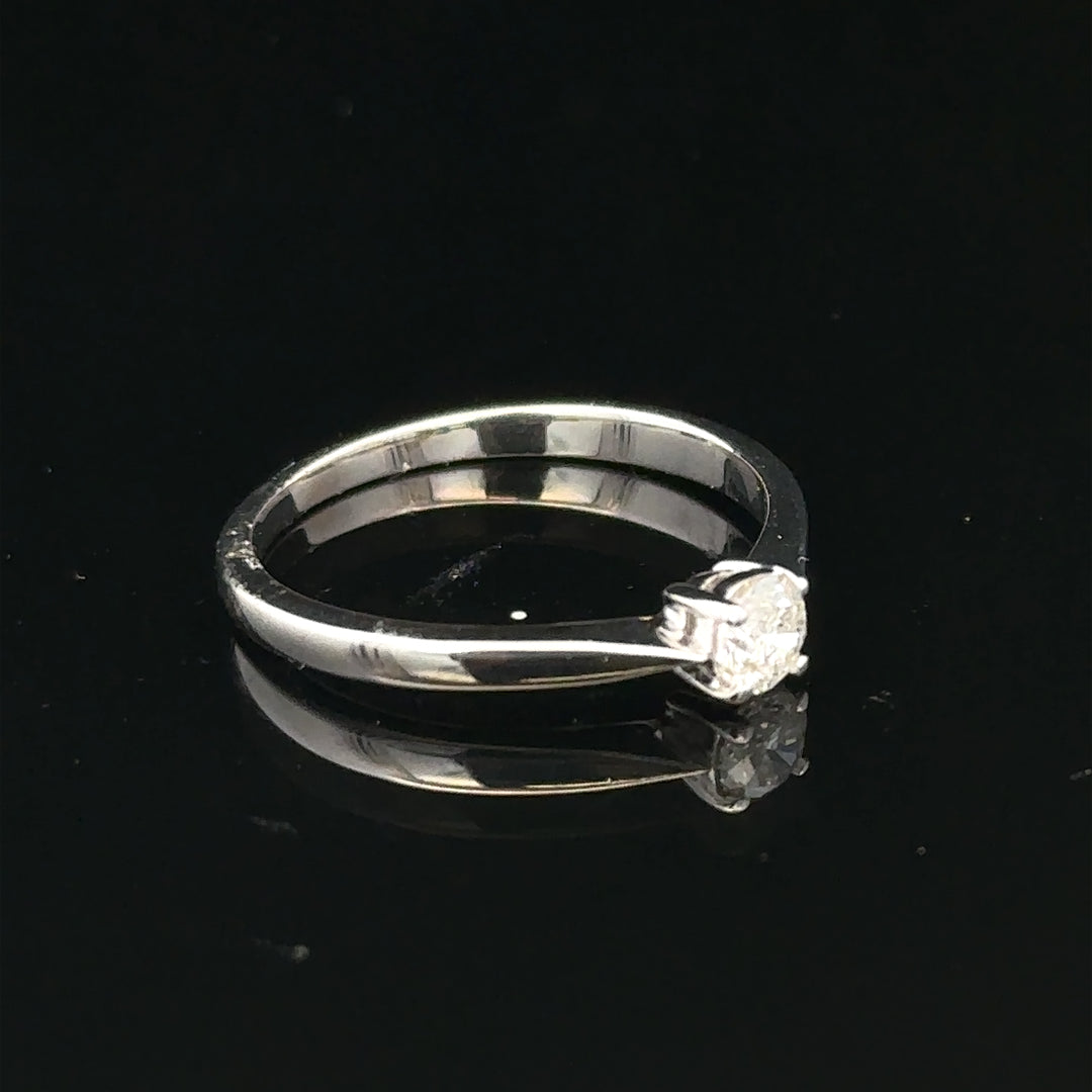 18ct white gold diamond ring in size M with sparkling diamonds, elegant jewelry piece showcasing fine craftsmanship.