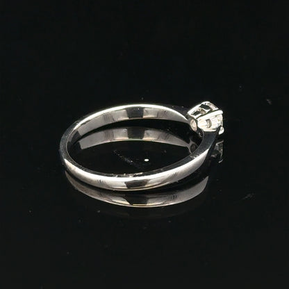 18ct white gold diamond ring in size M with sparkling diamonds, elegant jewelry piece with intricate design.