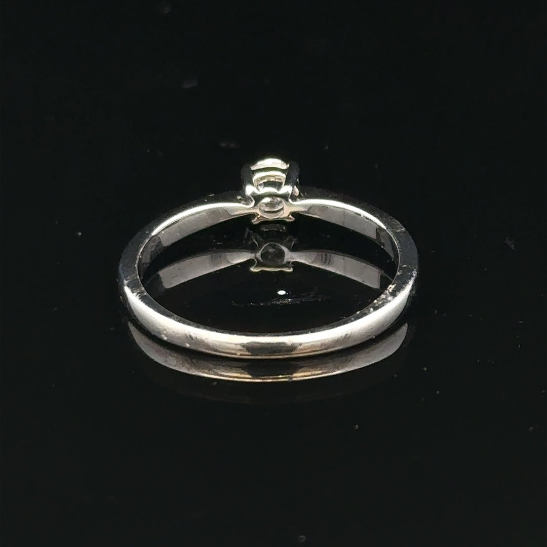 18ct white gold diamond ring in size M with sparkling diamonds, showcasing elegant jewelry craftsmanship.