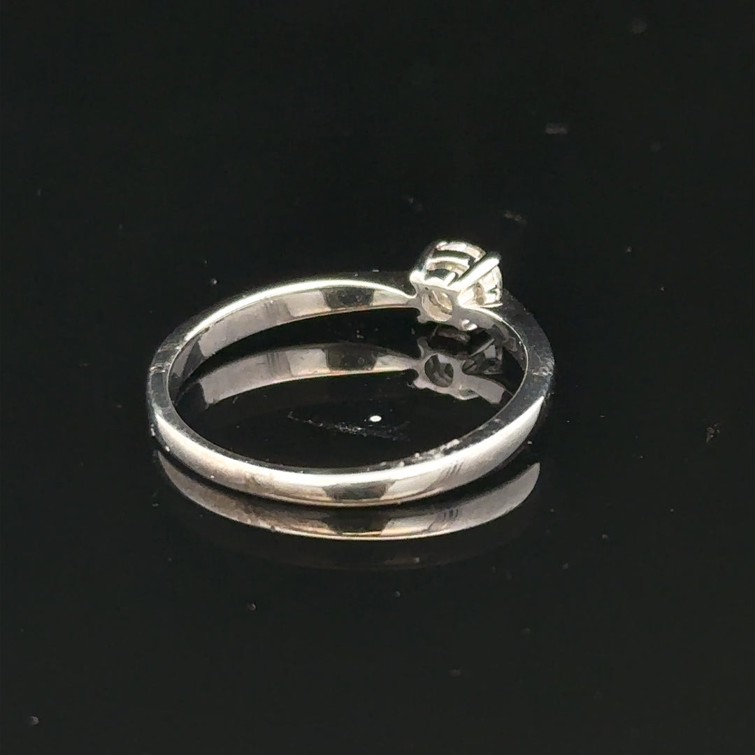 18ct white gold diamond ring in size M with sparkling diamonds, showcasing elegant jewelry craftsmanship.