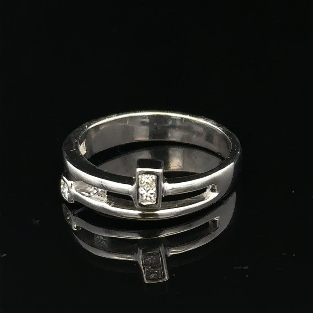 9ct white gold diamond ring size N with sparkling diamonds, showcasing elegant jewelry craftsmanship.