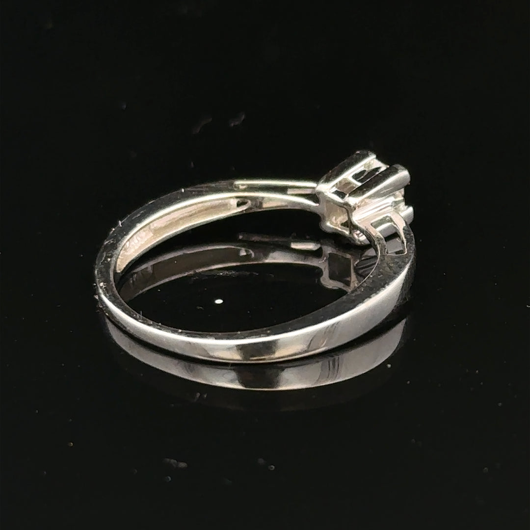 9ct white gold diamond ring with sparkling stones, showcasing elegant design and fine craftsmanship.