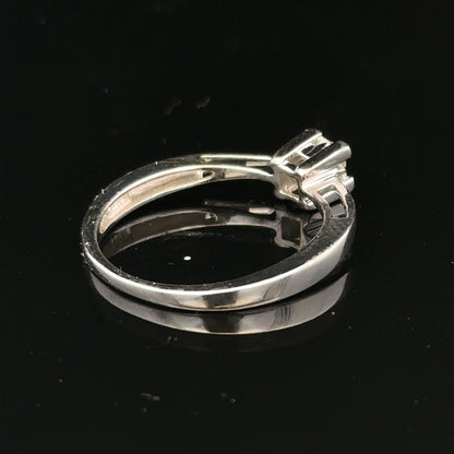 9ct white gold diamond ring with sparkling stones, showcasing elegant design and fine craftsmanship.