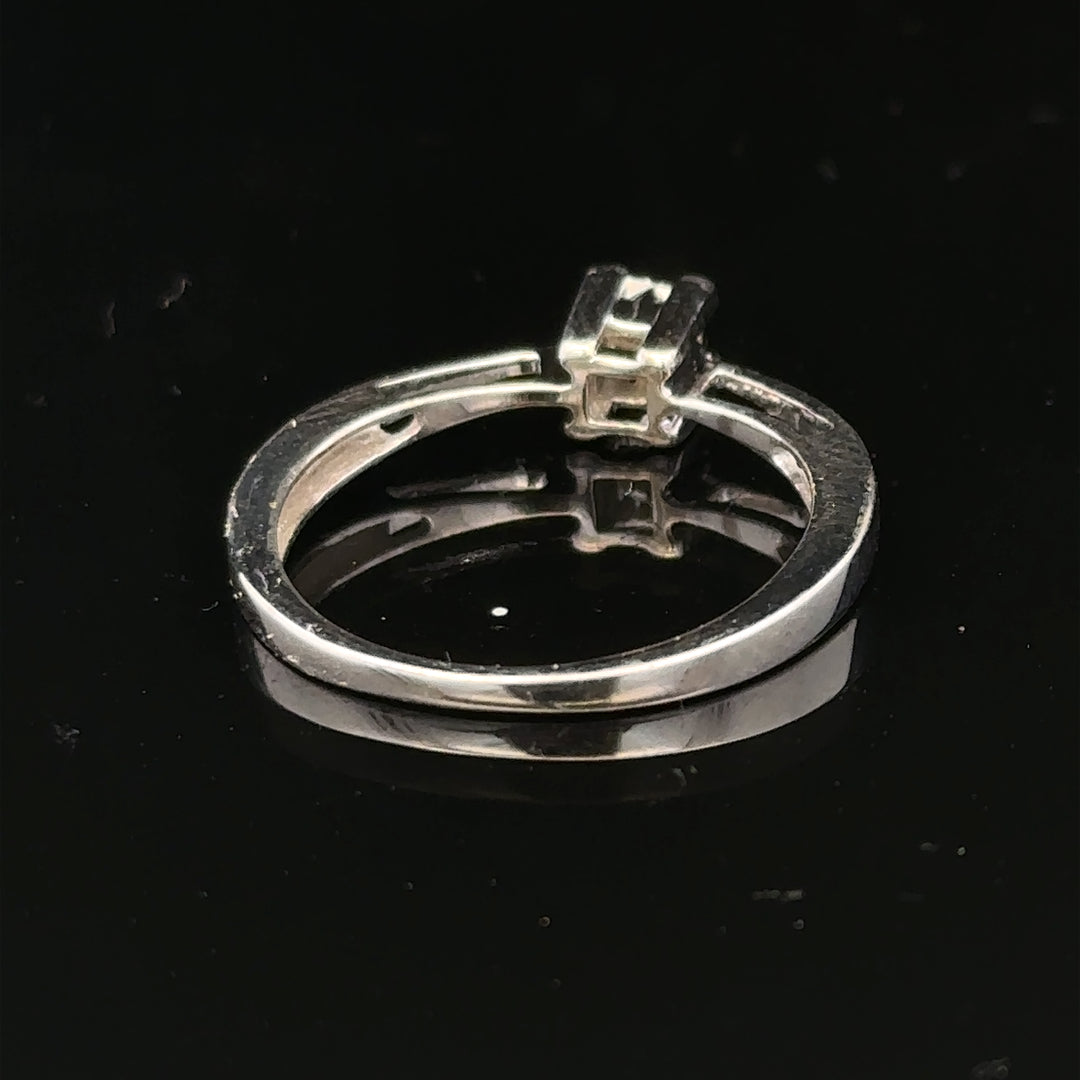 9ct white gold diamond ring with sparkling diamonds, showcasing elegant jewelry design and fine craftsmanship.