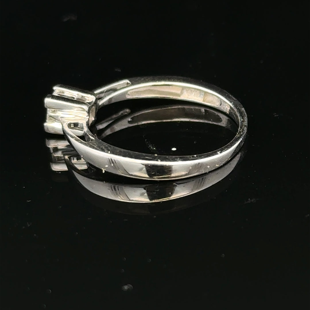 9ct white gold diamond ring with sparkling stones, showcasing a sleek and elegant design, unbranded jewelry piece.