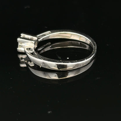 9ct white gold diamond ring with sparkling stones, showcasing a sleek and elegant design, unbranded jewelry piece.