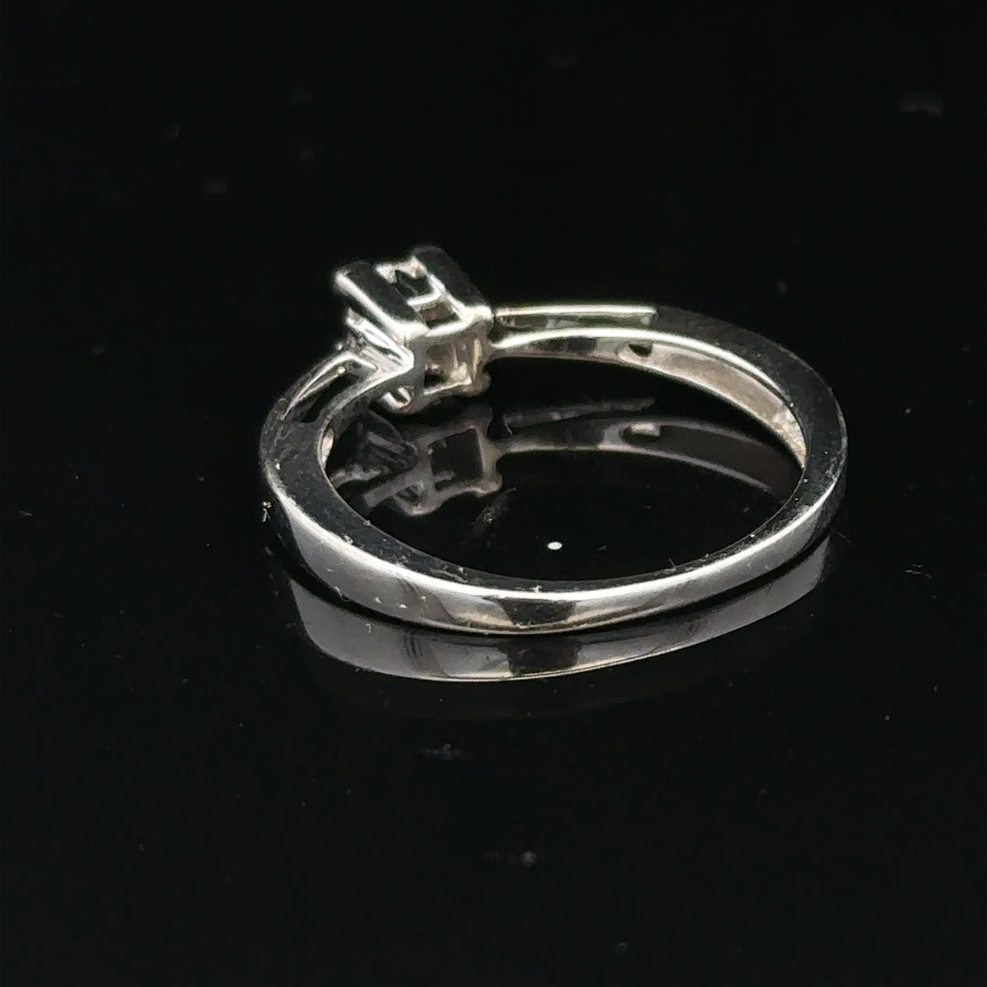 Elegant 9ct white gold diamond ring showcasing sparkling diamonds and a sleek band, perfect for special occasions or everyday wear.