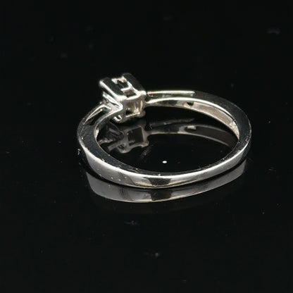 Elegant 9ct white gold diamond ring showcasing sparkling diamonds and a sleek band, perfect for special occasions or everyday wear.