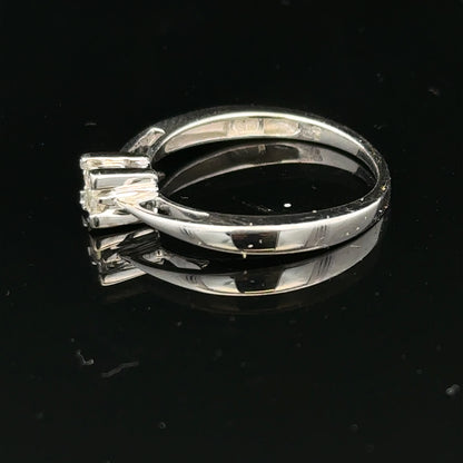 9ct white gold diamond ring with sparkling stones, showcasing elegant craftsmanship and a classic design.