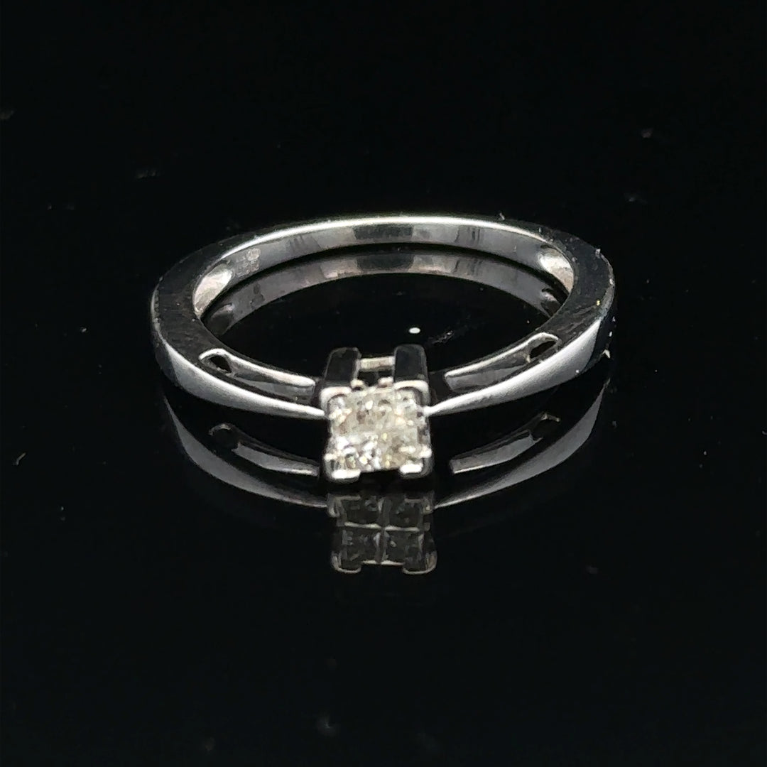 9ct white gold diamond ring with sparkling diamonds set in a classic design.