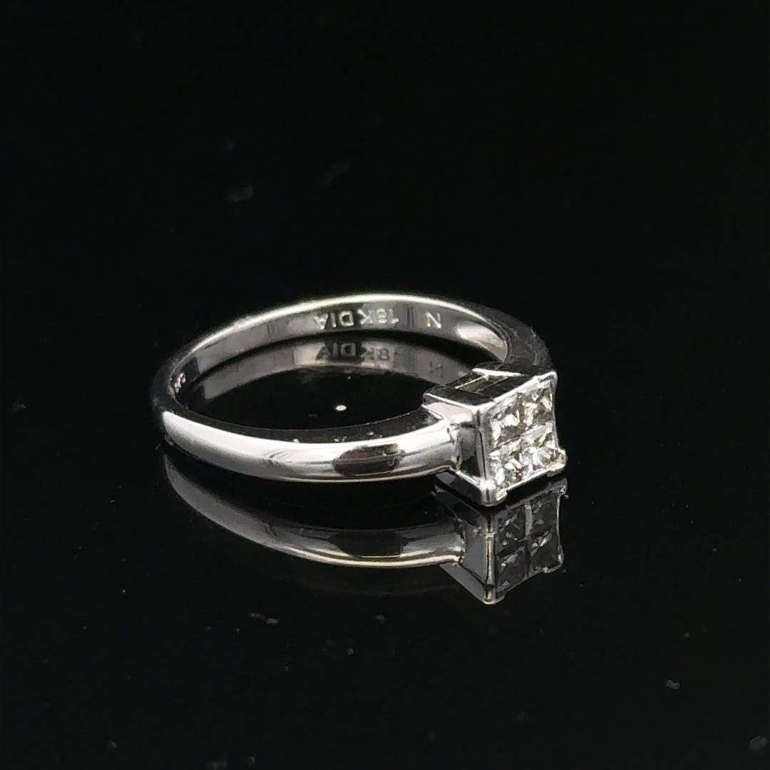 18ct white gold diamond ring with small sparkling diamonds, size J1/2, elegant jewelry piece.