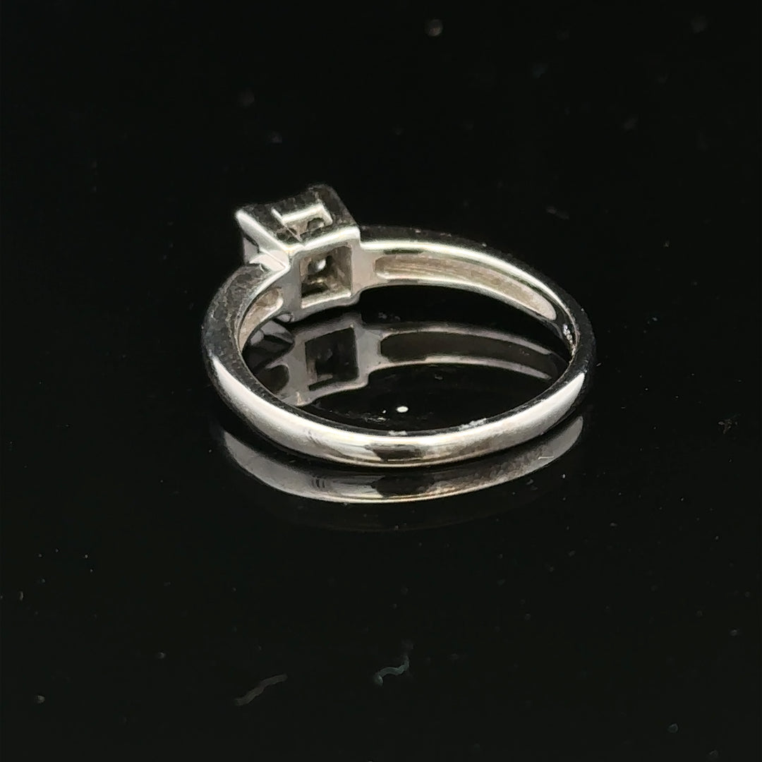 18ct white gold diamond ring, size J1/2, featuring a sparkling diamond setting with a sleek, elegant design.