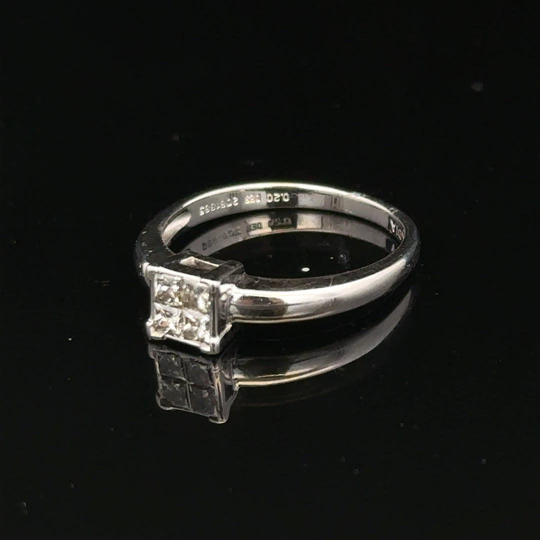 18ct white gold diamond ring in size J1/2, featuring a sparkling central diamond and elegant band design.