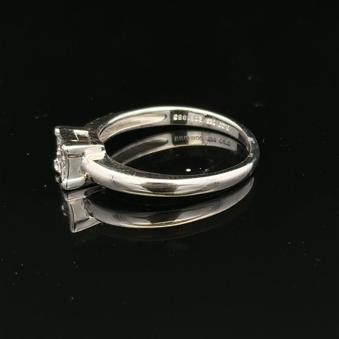 18ct white gold diamond ring in size J1/2 featuring a sparkling diamond setting on a sleek band.