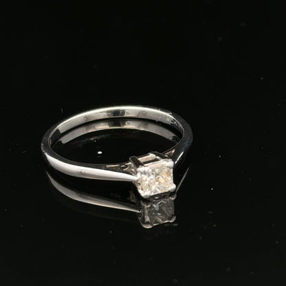 18ct yellow gold diamond ring with a 1/3 carat princess cut diamond, size M, featuring elegant jewelry design.