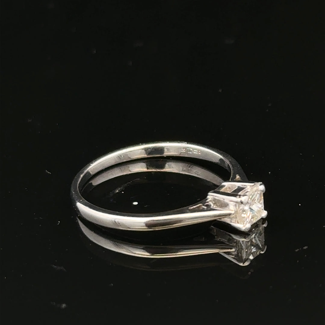 18ct yellow gold diamond ring with a 1/3 carat princess cut diamond, size M, featuring elegant jewelry craftsmanship.