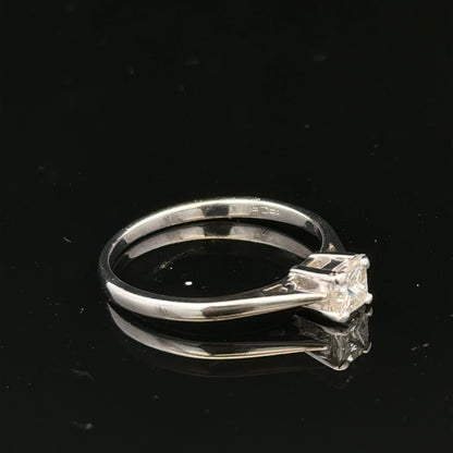 18ct yellow gold diamond ring with a 1/3 carat princess cut diamond, size M, featuring elegant jewelry craftsmanship.