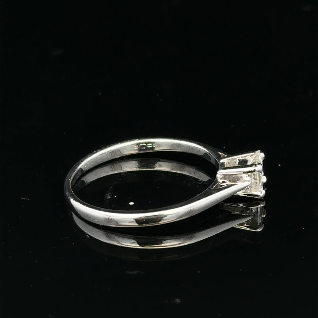 18ct yellow gold diamond ring with a 1/3 carat princess cut diamond in size M, showcasing elegant jewelry design