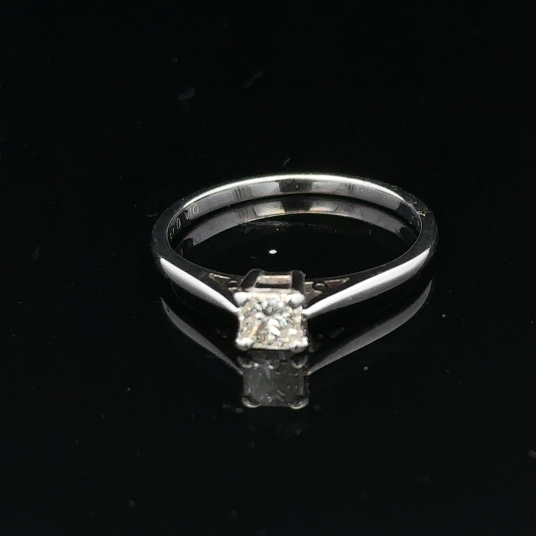 18ct yellow gold diamond ring with a 1/3 carat princess cut diamond, size M, featuring elegant jewelry craftsmanship.
