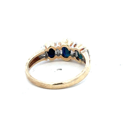 9ct yellow gold diamond ring in size L1/2 with sparkling diamonds, crafted by Reeves and Sons, displayed on a white background.