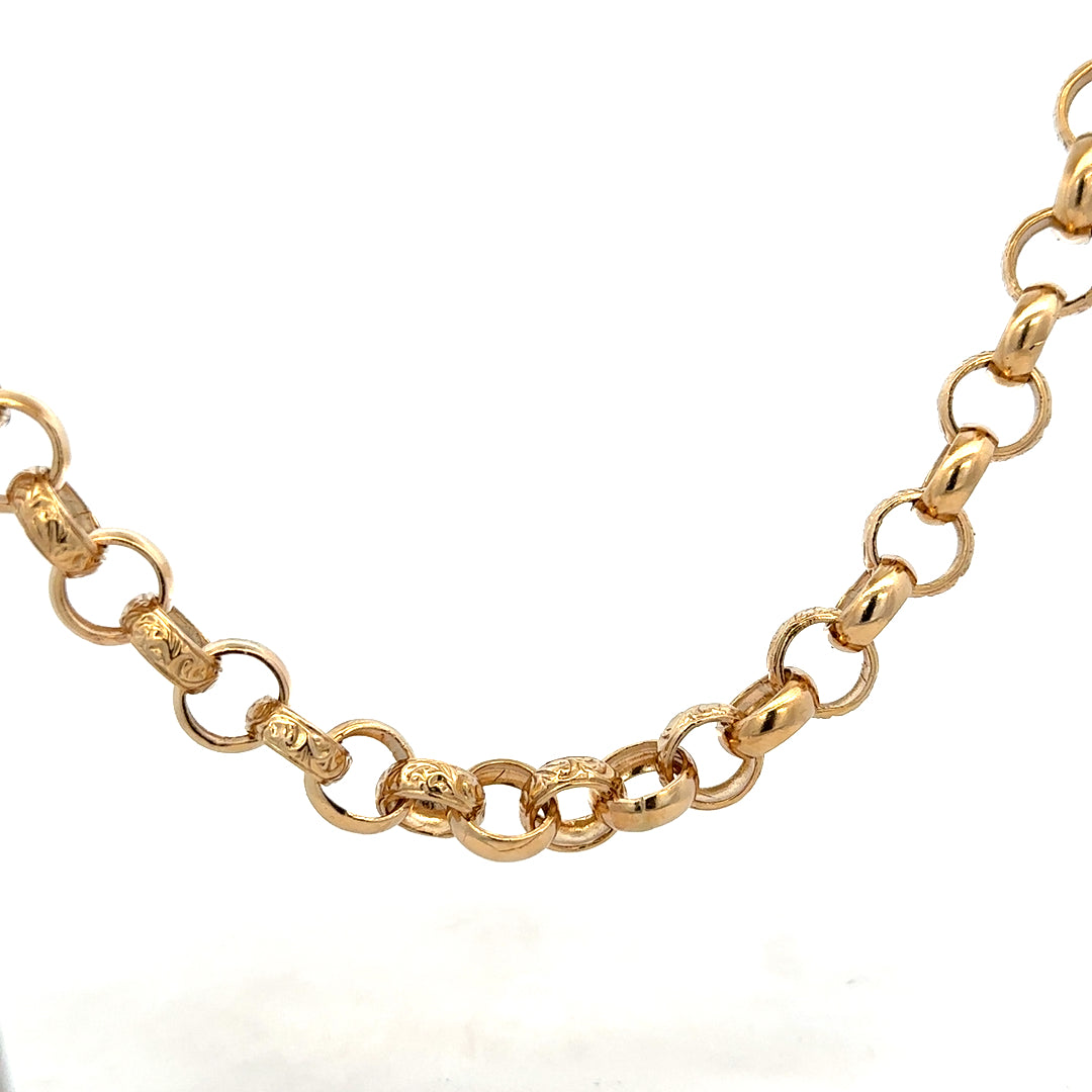 9ct yellow gold belcher chain weighing 86.6g, crafted by Reeves and Sons, shown in a close-up view highlighting its links and shine.