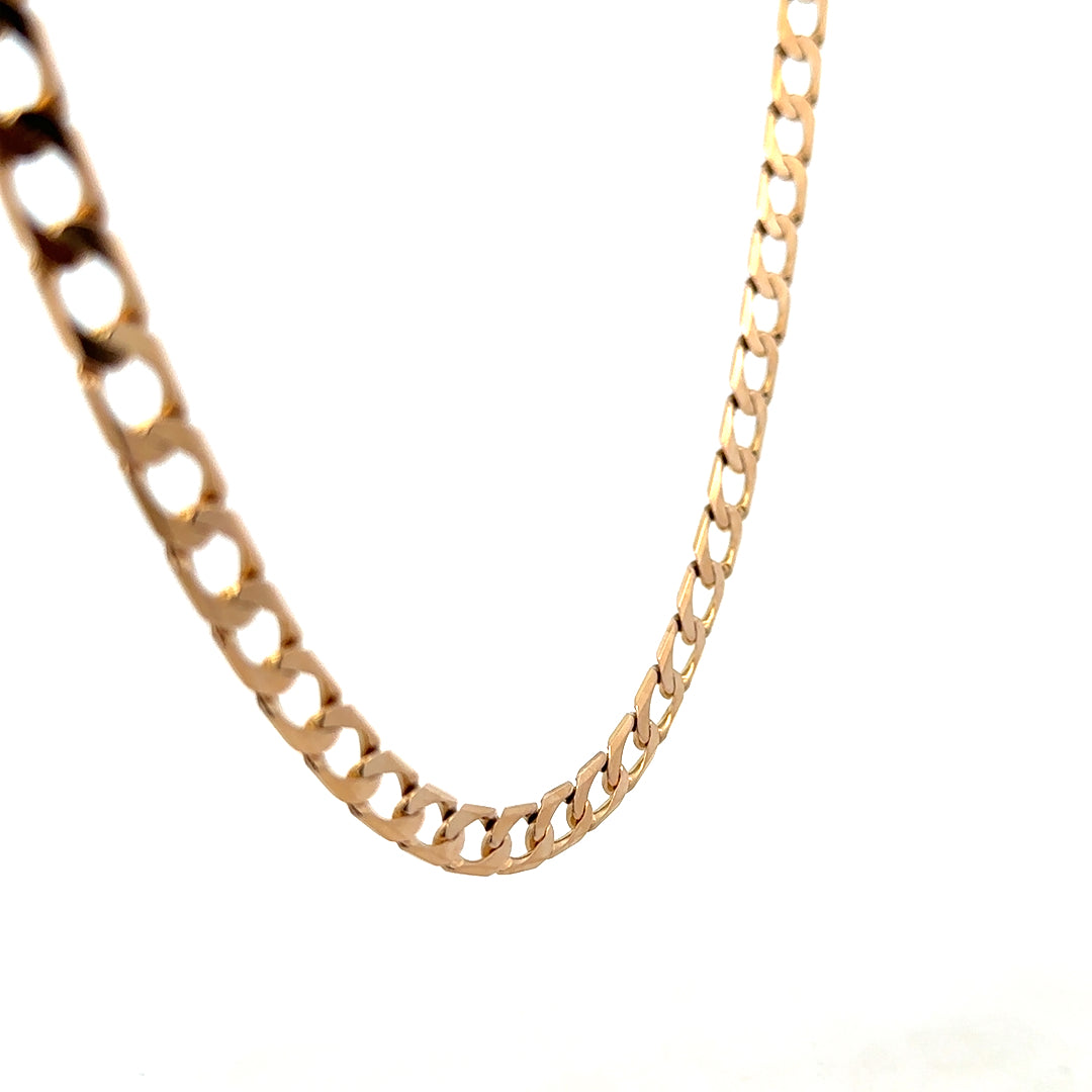 9ct yellow gold curb chain weighing 27.6g, featuring a classic design from Reeves and Sons.