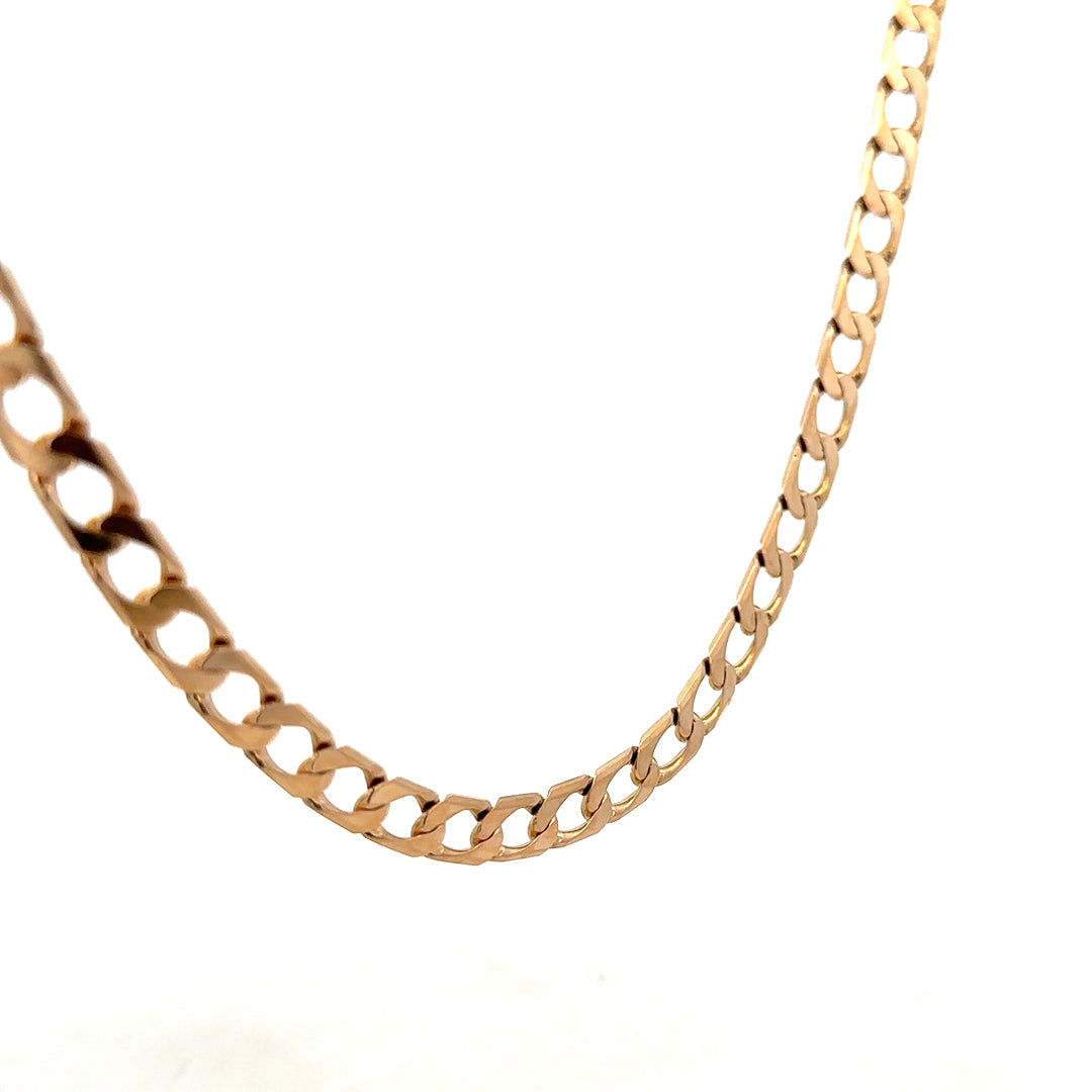 9ct yellow gold curb chain weighing 27.6g with Reeves and Sons branding, shown in a close-up image highlighting the chain links.