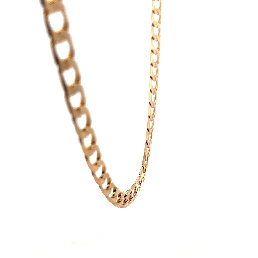 9ct yellow gold curb chain weighing 27.6g, featuring polished links, by Reeves and Sons.