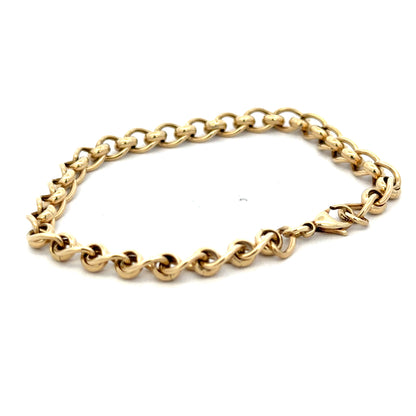 9ct yellow gold rollerball bracelet with a polished finish, weighing 13.2 grams, by Reeves and Sons.