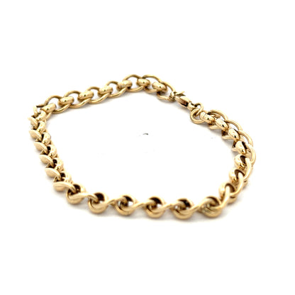 9ct yellow gold rollerball bracelet weighing 13.2g with smooth round beads, handcrafted by Reeves and Sons.