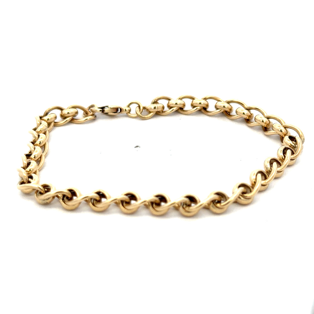 9ct yellow gold rollerball bracelet with a smooth, shiny finish, weighing 13.2g, crafted by Reeves and Sons.