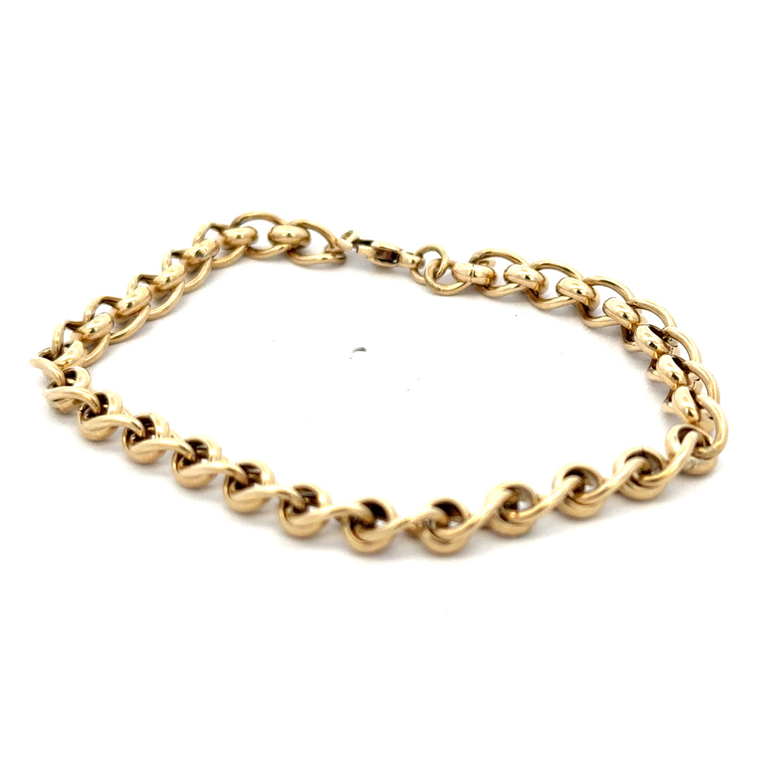9ct yellow gold rollerball bracelet weighing 13.2g with smooth round beads, displayed on a neutral background.