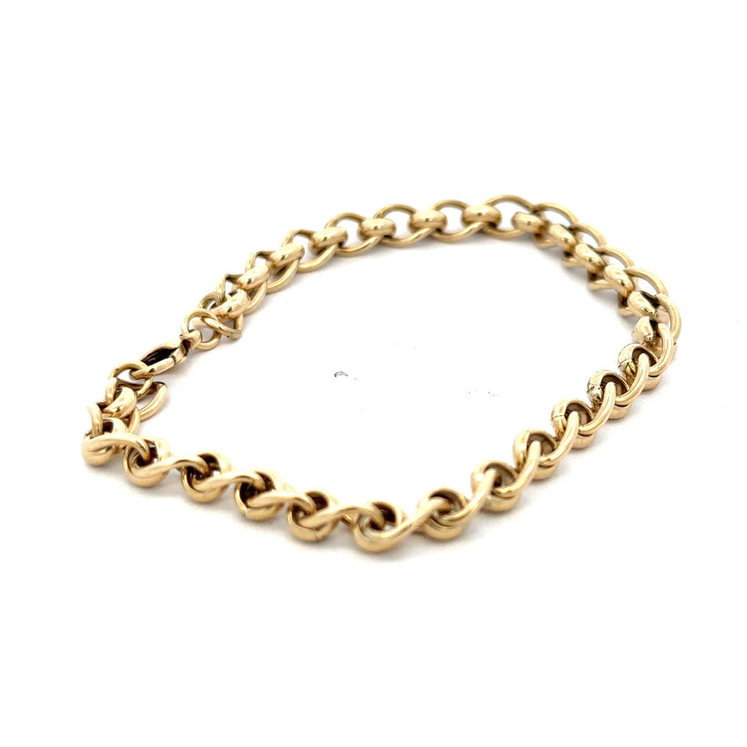 9ct yellow gold rollerball bracelet weighing 13.2g with smooth rounded beads, crafted by Reeves and Sons.