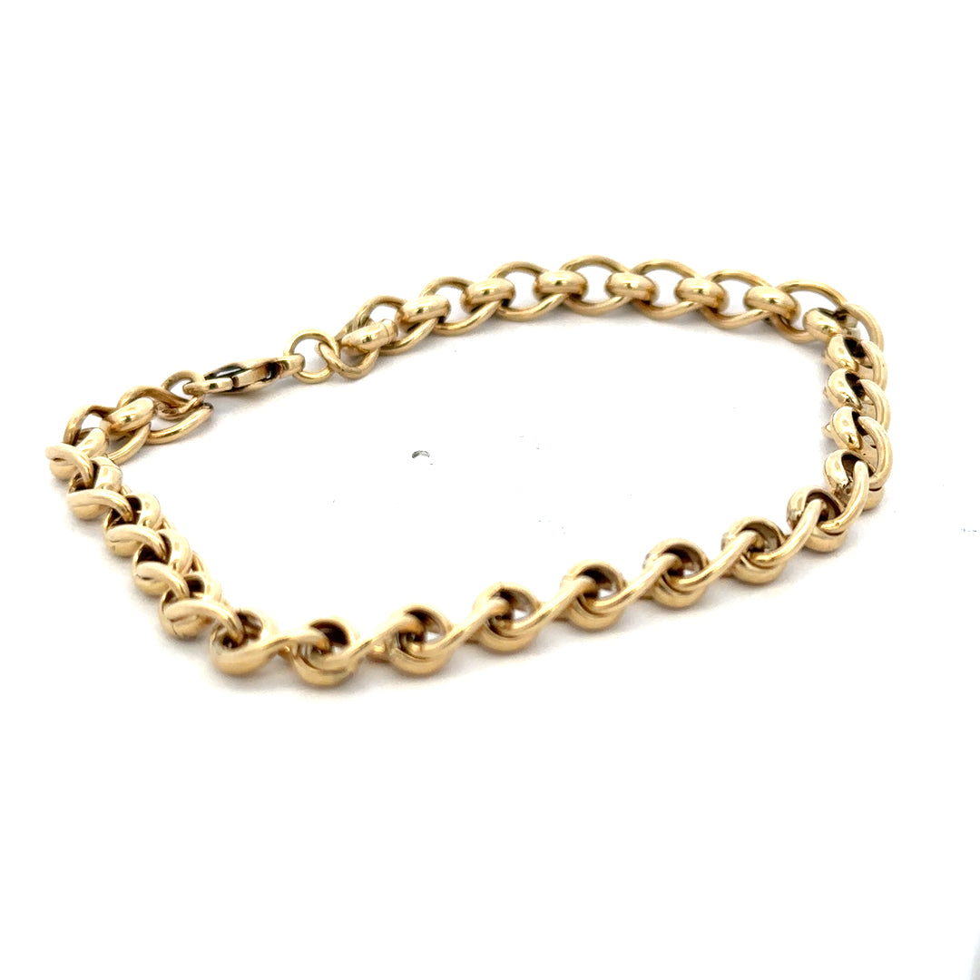 9ct yellow gold rollerball bracelet weighing 13.2g with smooth spherical beads, crafted by Reeves and Sons.