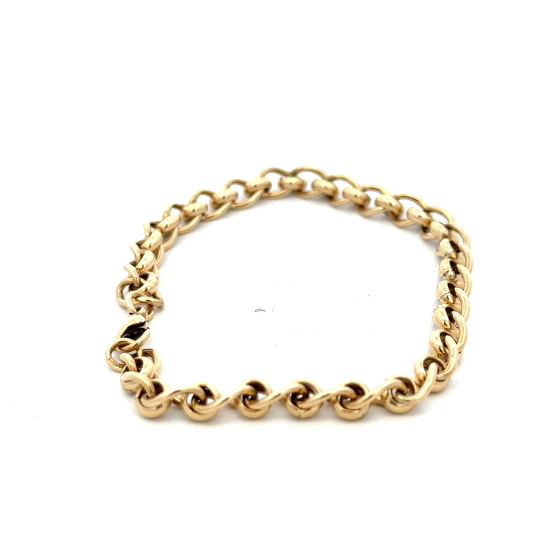 9ct yellow gold rollerball bracelet weighing 13.2g with smooth gold spheres, crafted by Reeves and Sons.