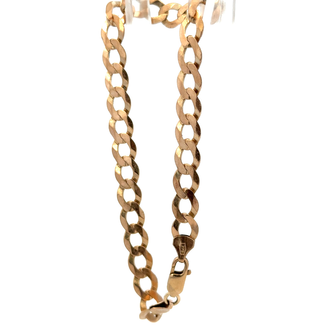 9ct yellow gold curb bracelet with a polished finish and secure clasp, weighing 7.7 grams, by Reeves and Sons.